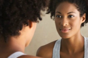 black-woman-looking-in-the-mirror
