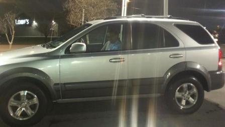 The couple's 2006 Kia.